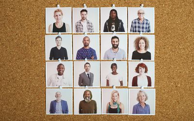 Pictures of People on a Cork Board