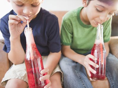 children drinking soda