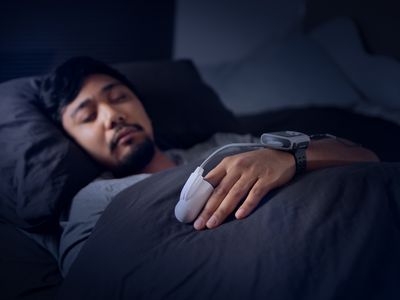 sleep apnea test study device on someone while they sleep