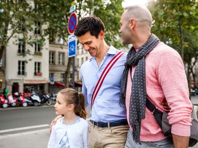 Same sex couple spending with child
