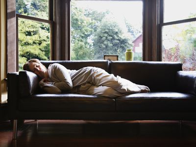 Woman asleep on couch