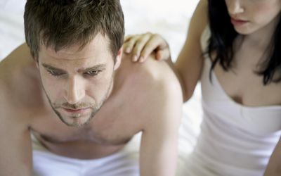 man and women in the bedroom contemplating the sexual side effect of antidepressants