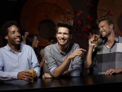 Models pose as male friends drinking alcohol