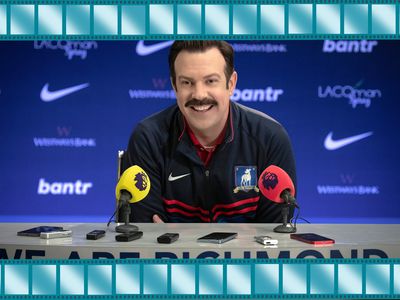 Ted Lasso giving a press conference