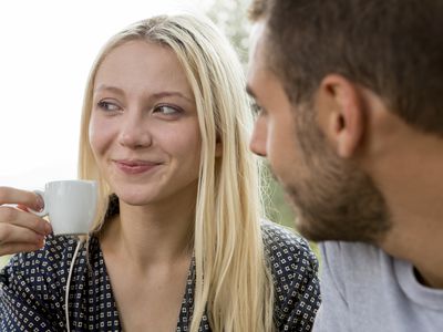 Smiling woman admired by her boyfriend