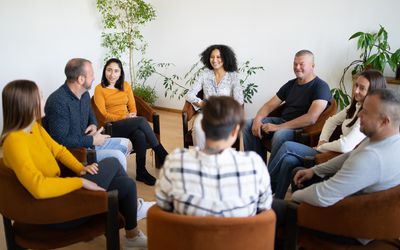 A therapy group having a discussion