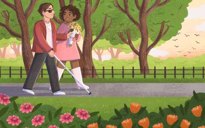 A woman carrying flowers guides her blind boyfriend as they go for a springtime walk
